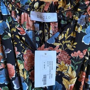 NWT, midi dress with slit on front left side. From a boutique shop down in NYC